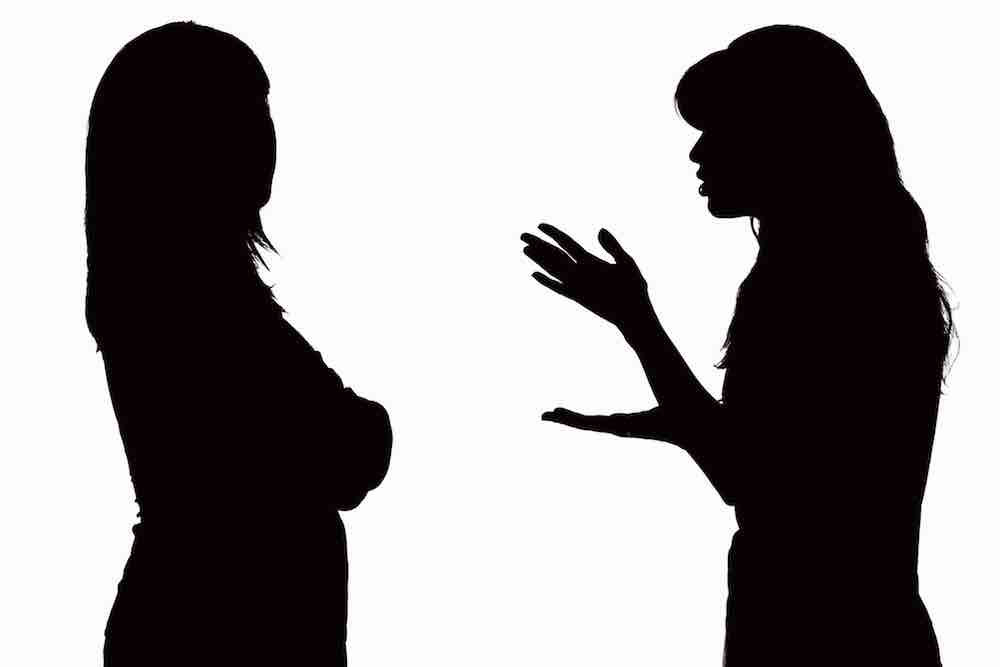 Black and white silhouette of relations between mom and teenage daughter